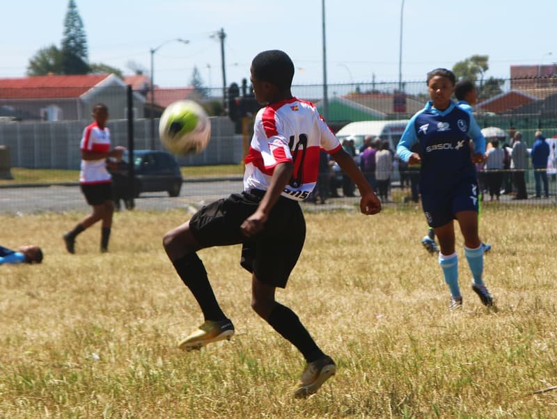 Shosholoza player controlling the ball mid-match