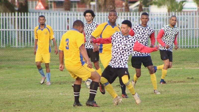 Shosholoza player challenging for the ball in a match